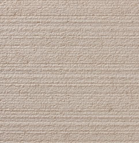Color/Finish variation image for Pacific Beige Limestone. The surface finish shown is chiseled. The dominant color shown is tan; with beige, brown, gray, orange/rust, pink and cream secondaries. The color mix creates a warm feeling. Regular and linear color patterns.