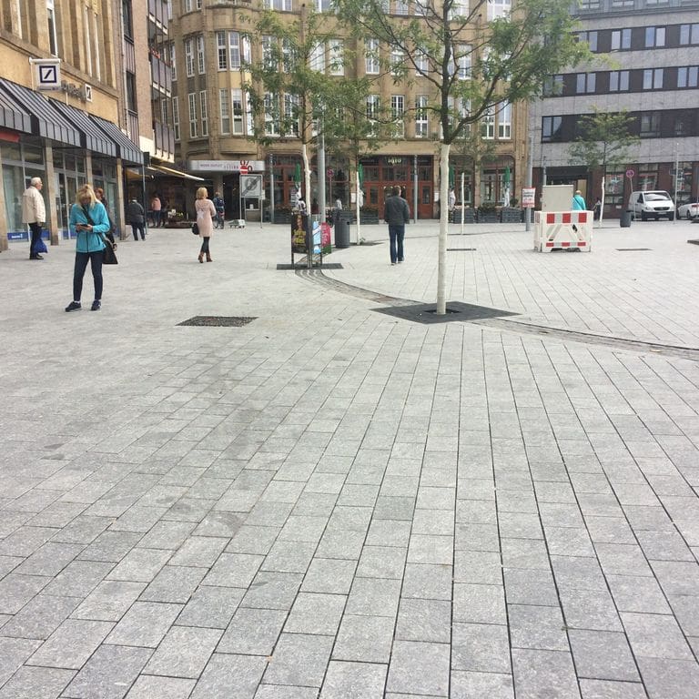 Application image for Granite - Colonial Blue. The image shows this material being used in a public area application. The dominant color shown is gray.