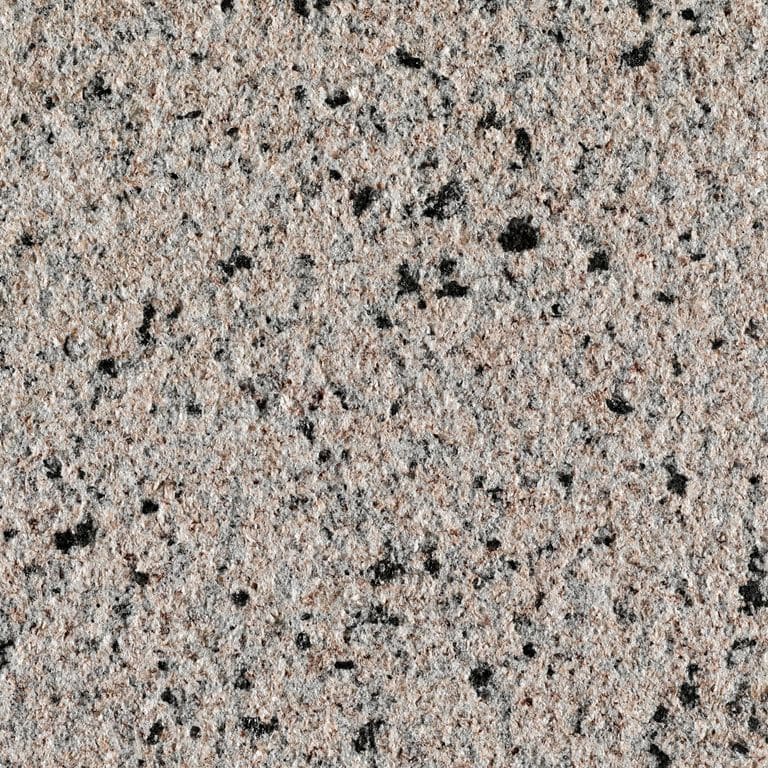 Feature image for Granite - Red Star. The surface finish shown is sand blasted. The dominant color shown is pink; with beige, black, brown, green, orange/rust, pink, purple, white, tan and cream secondaries. The color mix creates a warm feeling. Speckled and coarse speckled color patterns. Contains some mica and mineral inclusions.