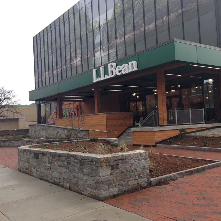 The image shows this material being used for path pavers and driveway aprons.