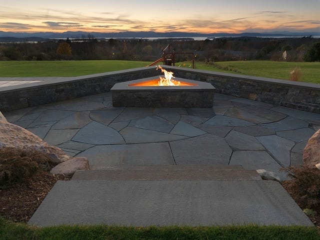 The image shows this material being used in an outdoor fire concepts application.