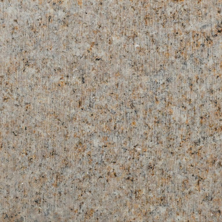 Color/Finish variation image for Golden Granite. The surface finish shown is adze. Dominant colors shown are brown and gray. The color mix creates a warm feeling.