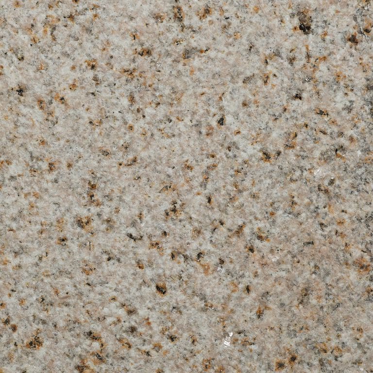 Color/Finish variation image for Golden Granite. The surface finish shown is bush hammered. Dominant colors shown are brown and tan. The color mix creates a warm feeling.