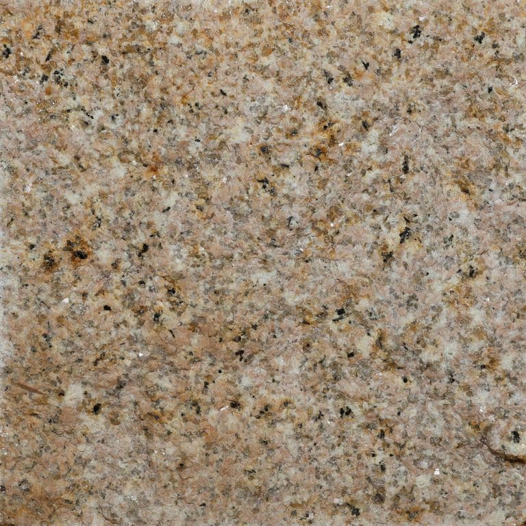 Color/Finish variation image for Golden Granite. The surface finish shown is split-face. The dominant color shown is brown. The color mix creates a warm feeling.
