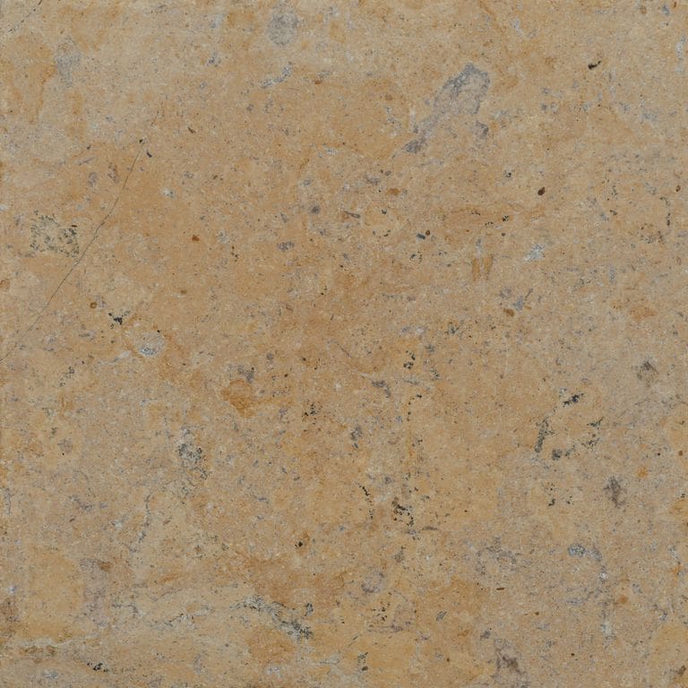 Color/Finish variation image for China Buff Limestone. The surface finish shown is tumbled. Dominant colors shown are brown, orange/rust and tan. The color mix creates a warm feeling.