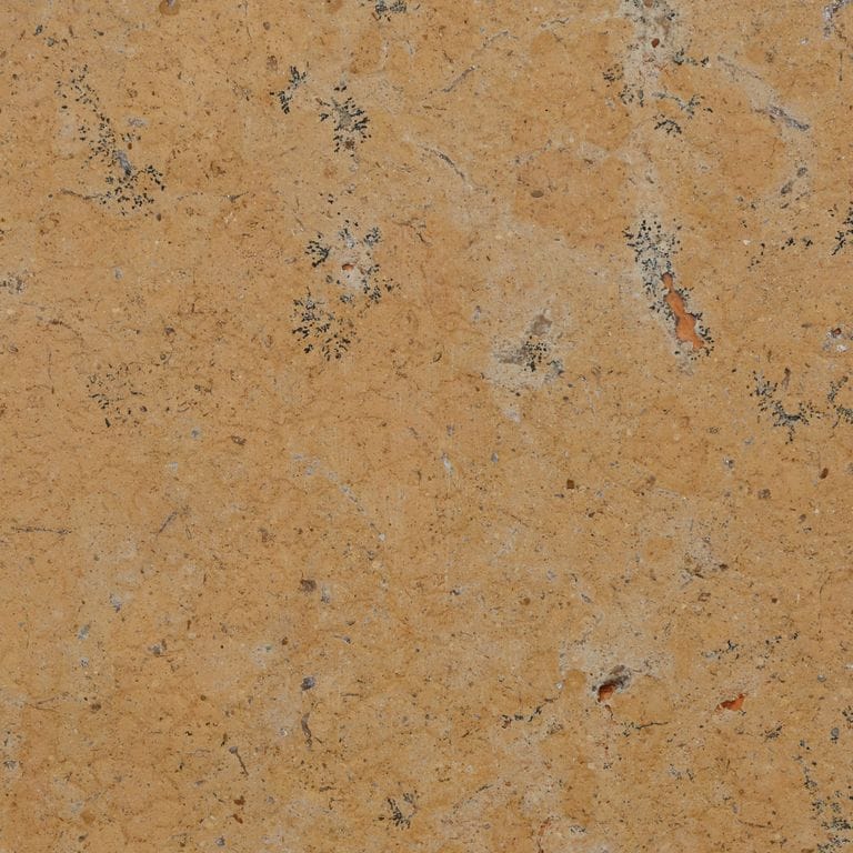 Color/Finish variation image for China Buff Limestone. The surface finish shown is acid washed. Dominant colors shown are brown and tan. The color mix creates a warm feeling.
