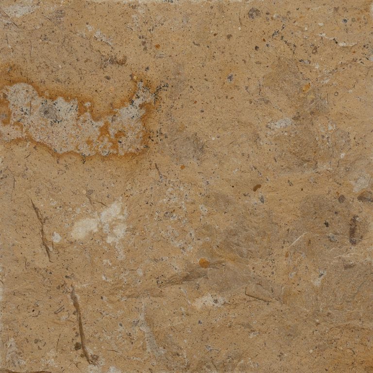 Color/Finish variation image for China Buff Limestone. The surface finish shown is split-face. Dominant colors shown are brown and tan. The color mix creates a warm feeling.