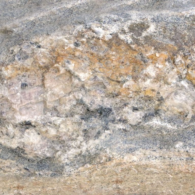 Color/Finish variation image for Fieldstone - Old New England Wall. The surface finish shown is . Dominant colors shown are beige, gray and tan. Exhibits "movement". Linear and blotched color patterns.