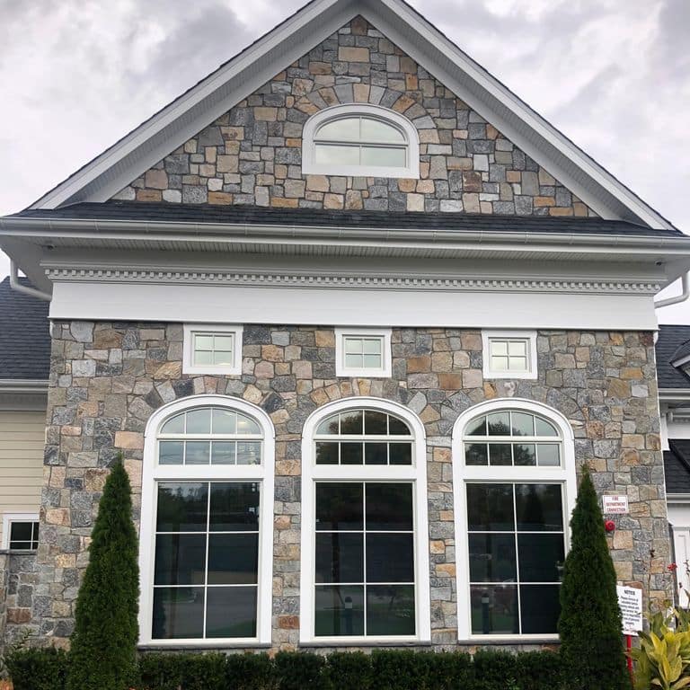 Application image for Granite - Connecticut Blend Thin Veneer. The image shows this material being used in a thin veneer application.