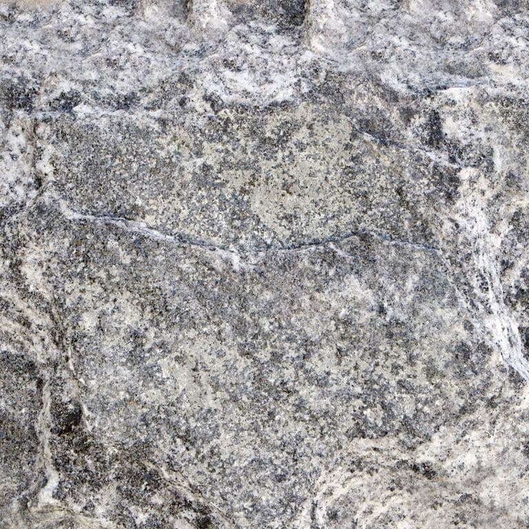 The surface finish shown is . The dominant color shown is gray. The color mix creates a cool feeling. Coarse speckled color pattern.
