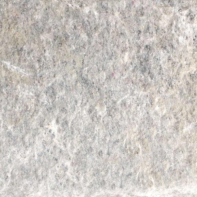The surface finish shown is split-face. Dominant colors shown are beige and gray. The color mix creates a cool feeling. Random, speckled, coarse speckled and blotched color patterns.