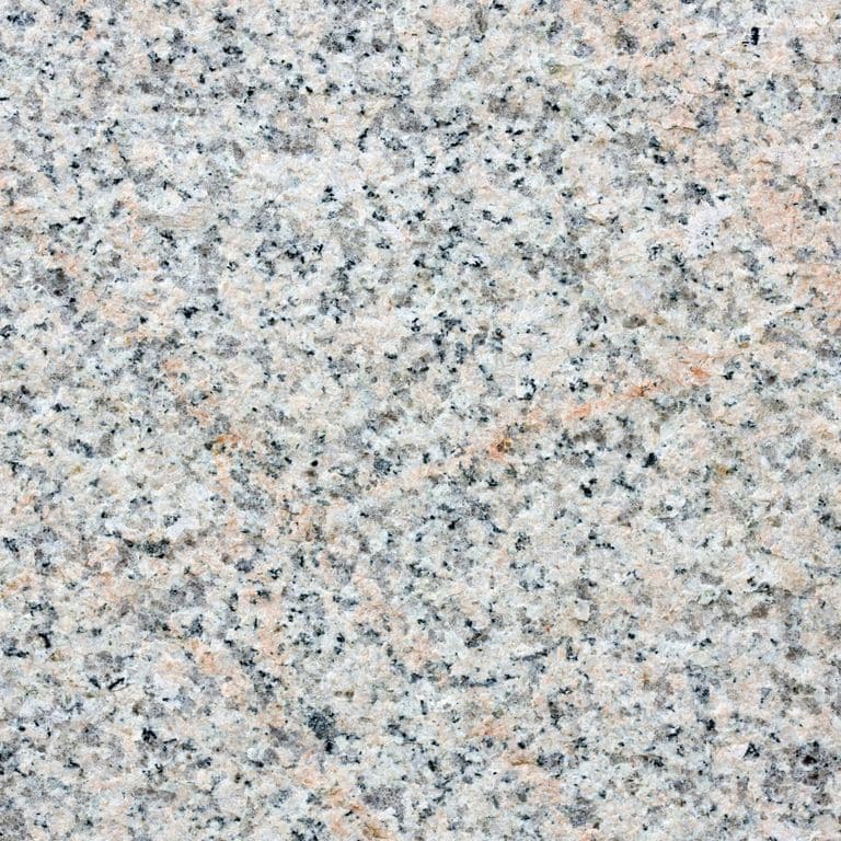 Color/Finish variation image for Granite - Millenium. The surface finish shown is flamed. The dominant color shown is gray; with beige, blue, pink and cream secondaries. Veined, speckled and coarse speckled color patterns.