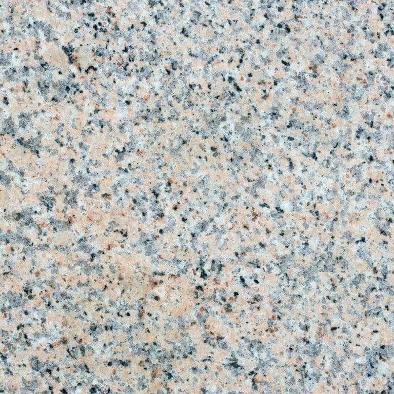Color/Finish variation image for Granite - Millenium. The surface finish shown is polished. Dominant colors shown are blue and gray; with beige and cream secondaries. Speckled and blotched color patterns.