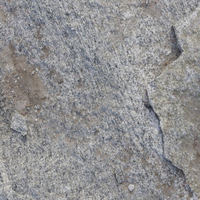 Color/Finish variation image for Black Mountain Granite - Natural. The dominant color shown is gray; with blue, brown, green, purple and white secondaries. Exhibits "movement" and the color mix creates a cool feeling. Random, speckled, blotched and linear color patterns.