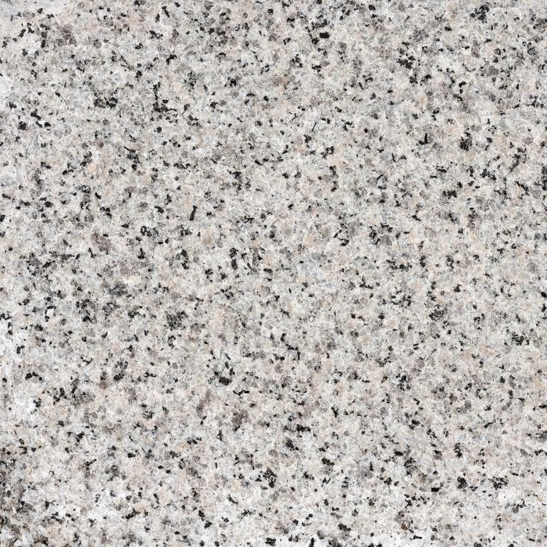 The surface finish shown is flamed. The dominant color shown is gray. The color mix creates a warm feeling. Coarse speckled color pattern.