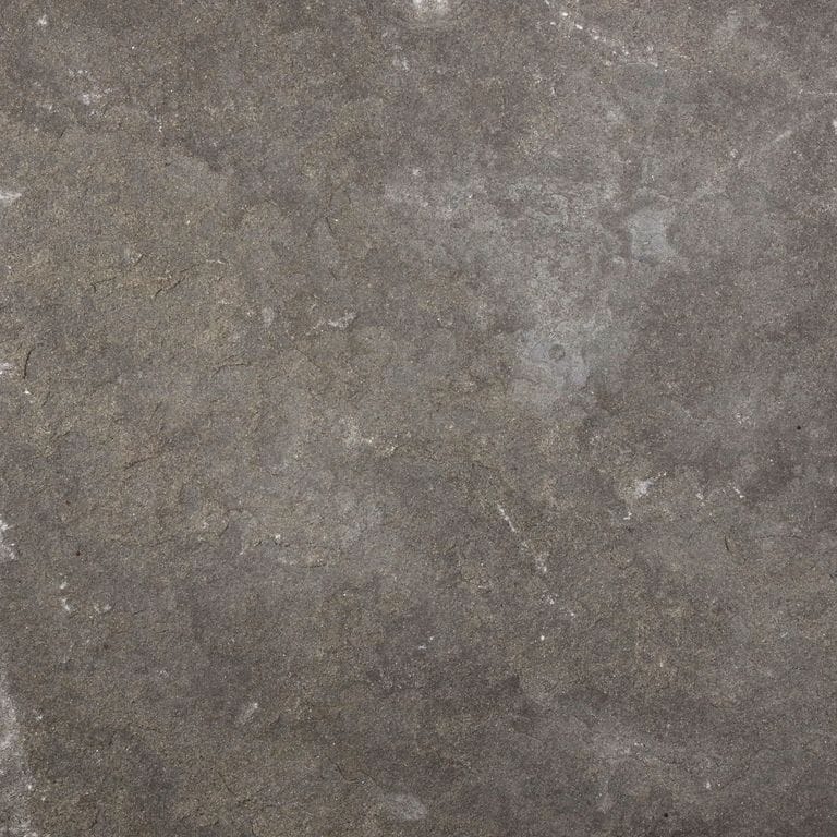 Color/Finish variation image for Brown Wave Sandstone. The surface finish shown is flamed. Dominant colors shown are brown, green, gray and purple; with a tan secondary. Exhibits "movement". Blotched and swirled color patterns.