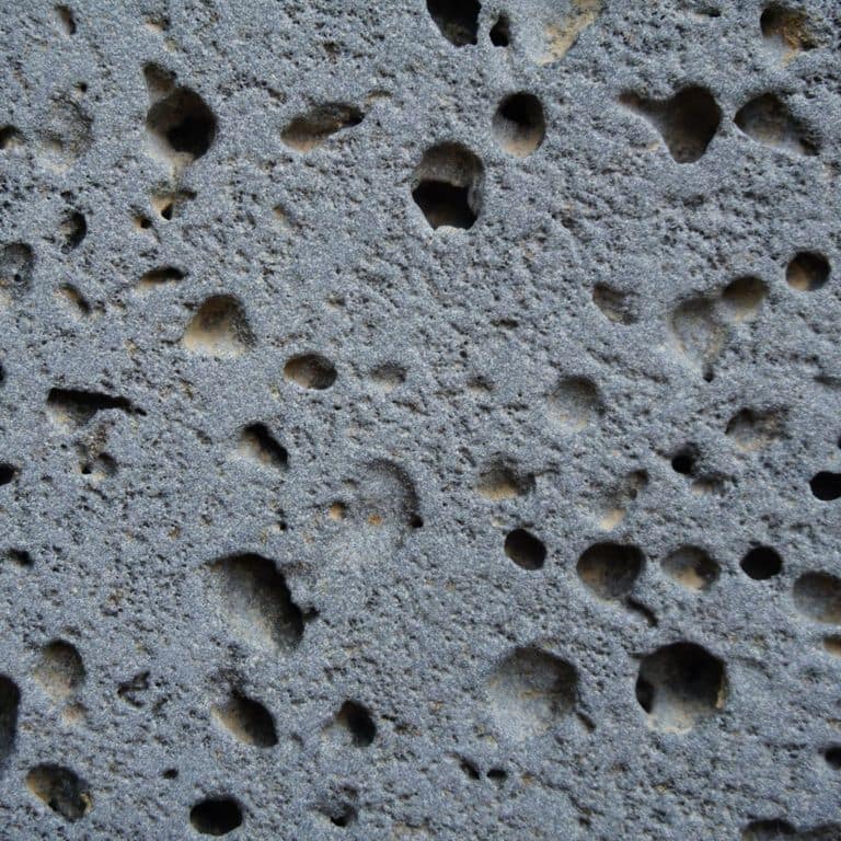 Best close-up image for Ankar Lava Basalt. The dominant color shown is gray; with a black secondary. Exhibits "movement" and the color mix creates a cool feeling. Solid color pattern.
