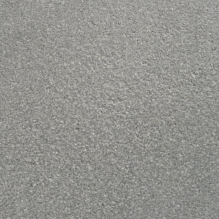 Swatch image for Ankar Gray Basalt. The surface finish shown is sand blasted. The dominant color shown is gray; with beige, green and white secondaries. The color mix creates a cool feeling. Solid and fine speckled color patterns.