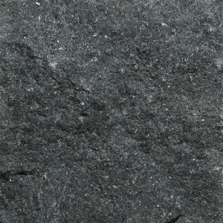 Color/Finish variation image for Zen Black Granite. The surface finish shown is split-face. Dominant colors shown are black and gray. The color mix creates a cool feeling.