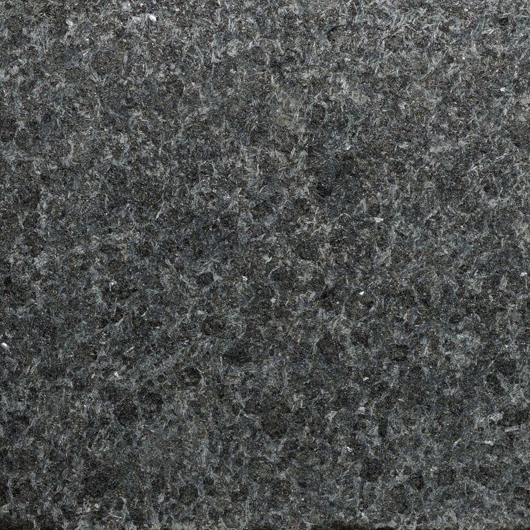 Color/Finish variation image for Zen Black Granite. The surface finish shown is acid washed. The dominant color shown is black. The color mix creates a cool feeling.