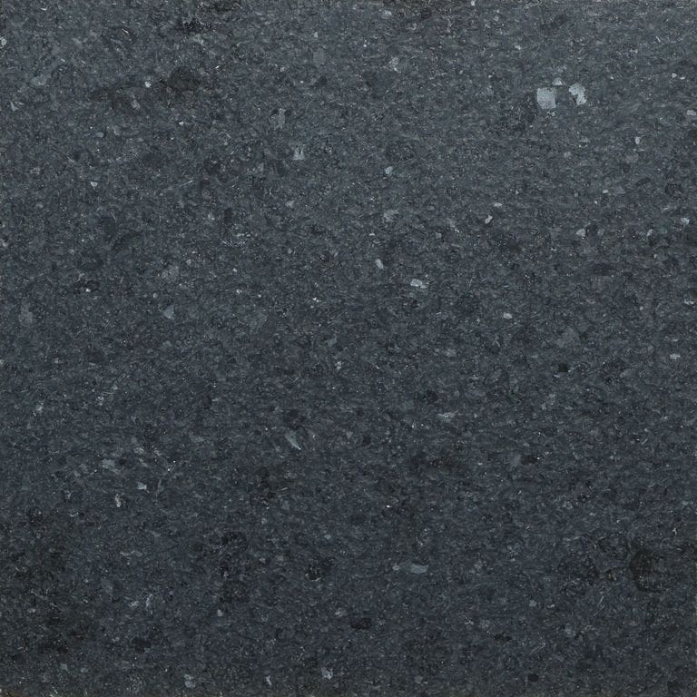 Color/Finish variation image for Zen Black Granite. The surface finish shown is leathered. The dominant color shown is black. The color mix creates a cool feeling.