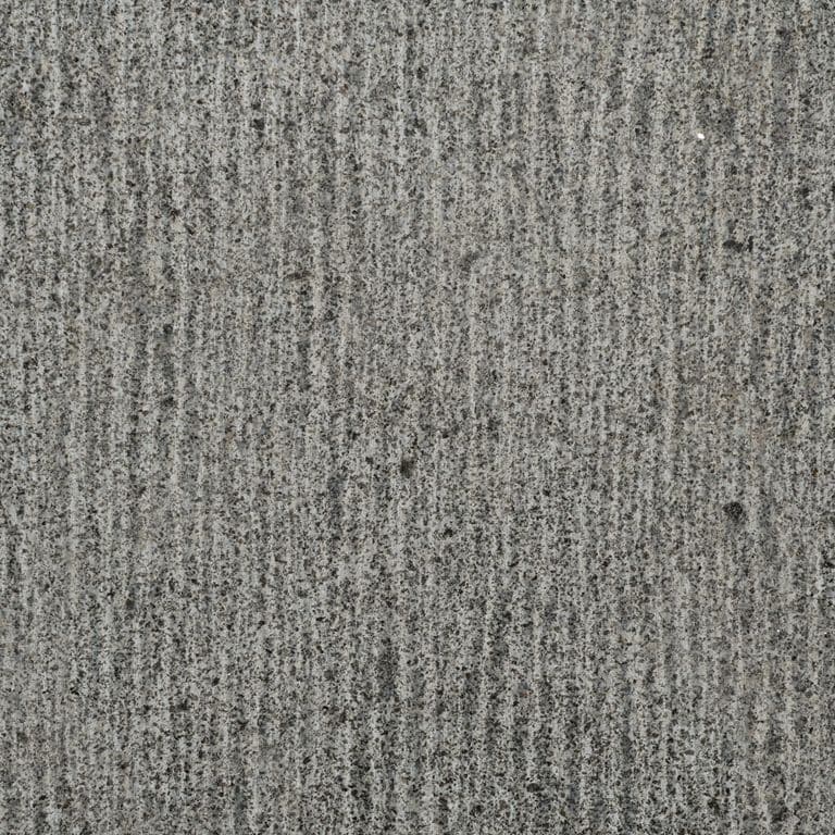 Color/Finish variation image for Zen Gray Granite. The surface finish shown is adze. The dominant color shown is gray. The color mix creates a cool feeling.
