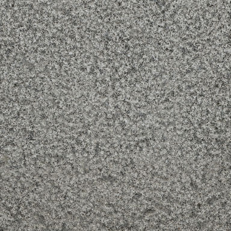 Color/Finish variation image for Zen Gray Granite. The surface finish shown is bush hammered. The dominant color shown is gray. The color mix creates a cool feeling.