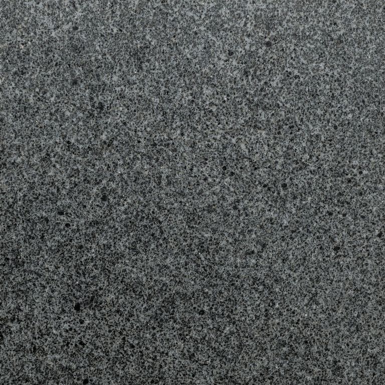 Color/Finish variation image for Zen Gray Granite. The surface finish shown is honed. Dominant colors shown are black and gray. The color mix creates a cool feeling.