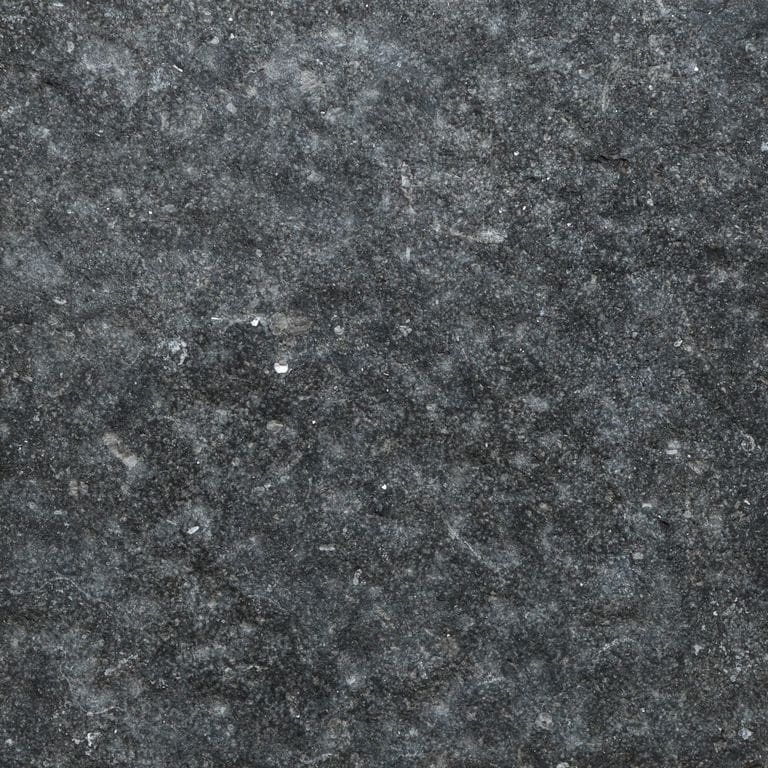 Color/Finish variation image for Belgian Bluestone Limestone. The surface finish shown is . Dominant colors shown are black and gray. The color mix creates a cool feeling.