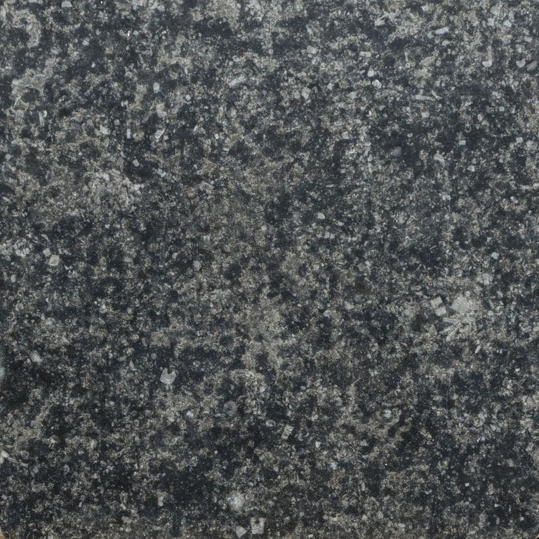 Color/Finish variation image for Belgian Bluestone Limestone. The surface finish shown is . Dominant colors shown are black and gray. The color mix creates a cool feeling.