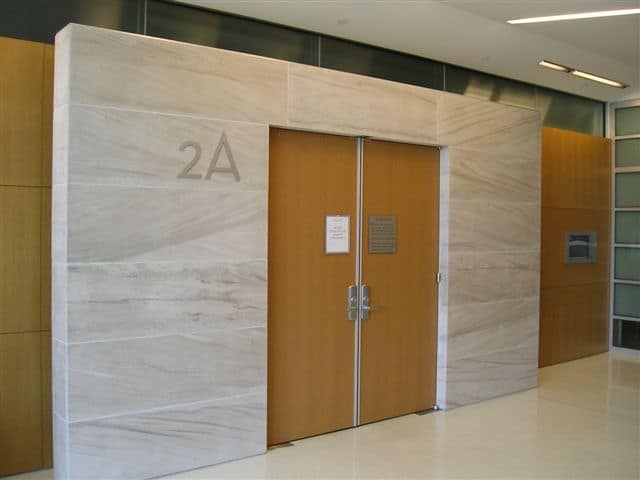 The image shows this material being used in a full bed veneer application.