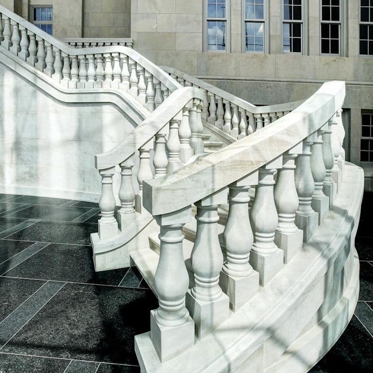 Application image for Silver Shadow Limestone. The image shows this material being used for landings and treads. This is a building stone for indoor and outdoor commercial and residential applications. Suitable for general use, low heat absorption surfaces, low slipperiness surfaces and high heel compatibilty situations. Relatively higher in price. This image has a Honed surface finish.