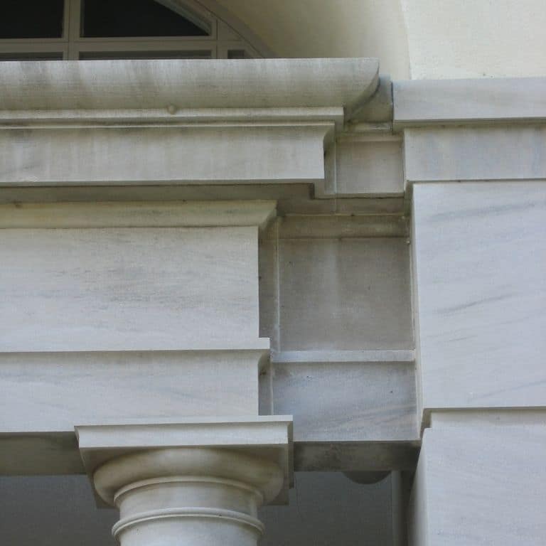 The image shows this material being used for columns and full bed veneer.