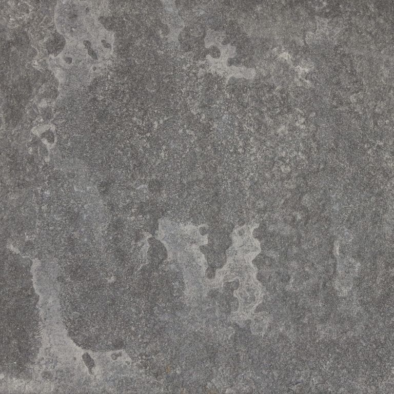 Swatch image for Lilac Bluestone - Natural Cleft. The surface finish shown is natural cleft. Dominant colors shown are brown and gray; with gray and purple secondaries. The color mix creates a warm feeling. Blotched and random color patterns. Contains mineral inclusions.