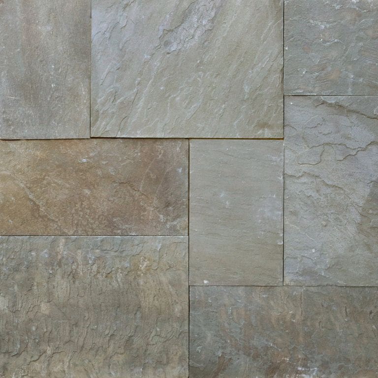 Best close-up image for Bluestone Natural Cleft - Green/Brown. The surface finish shown is natural cleft. Dominant colors shown are green and gray; with blue, brown, orange/rust, purple and tan secondaries. Exhibits "movement" and the color mix creates a warm feeling. Streaked, swirled and random color patterns.