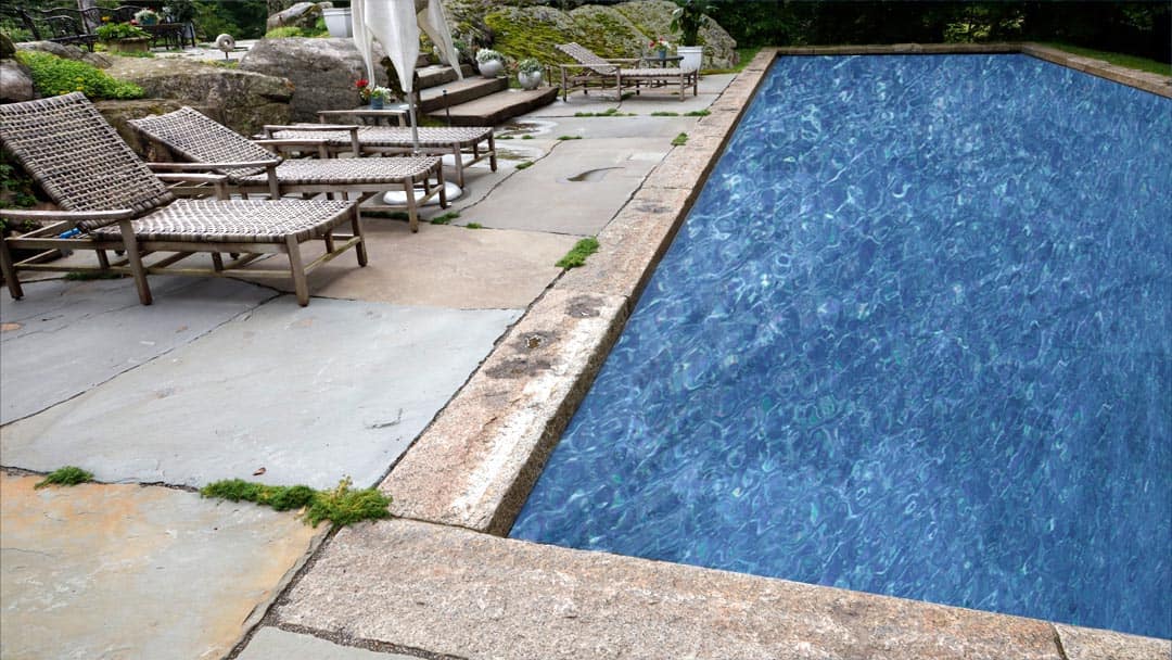 The image shows this material being used in a patio pavers application.