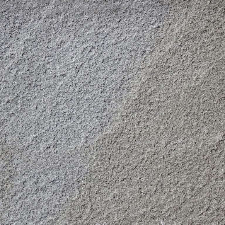 Color/Finish variation image for Full Color Mix Bluestone - Flamed. The surface finish shown is flamed. The dominant color shown is gray. The color mix creates a cool feeling. Fine speckled, blotched and cloudy color patterns.