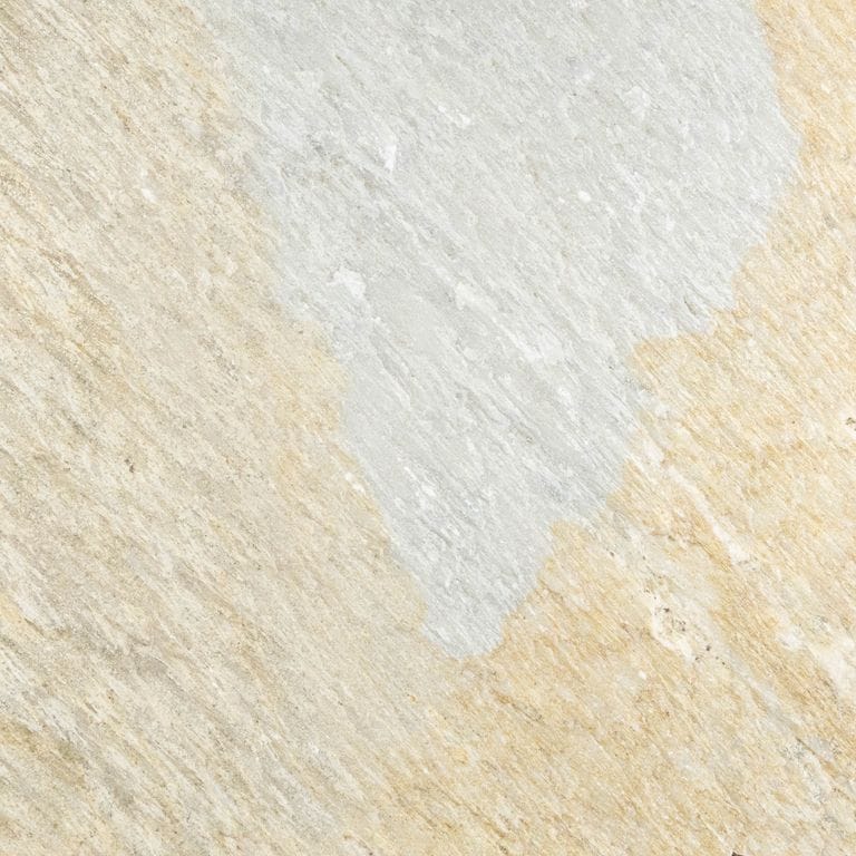 Color/Finish variation image for Slate - Mandarin Yellow. The surface finish shown is natural cleft. Dominant colors shown are beige, gray and tan. Exhibits "movement" and the color mix creates a warm feeling. Linear color pattern.