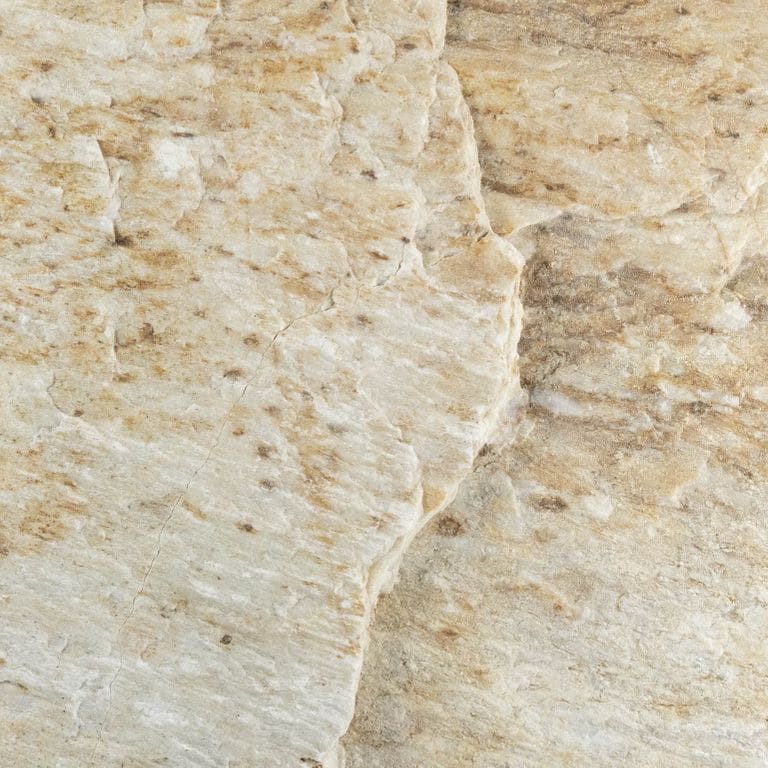 Color/Finish variation image for Slate - Mandarin Yellow. The surface finish shown is natural cleft. Dominant colors shown are beige and tan. The color mix creates a warm feeling. Random color pattern.