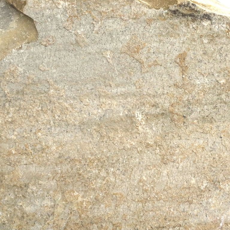 Color/Finish variation image for Slate - Mandarin Yellow. The surface finish shown is natural cleft. Dominant colors shown are beige and tan; with brown, gray, orange/rust, white and cream secondaries. Exhibits "movement" and the color mix creates a warm feeling. Random, fine speckled, blotched, linear and cloudy color patterns.