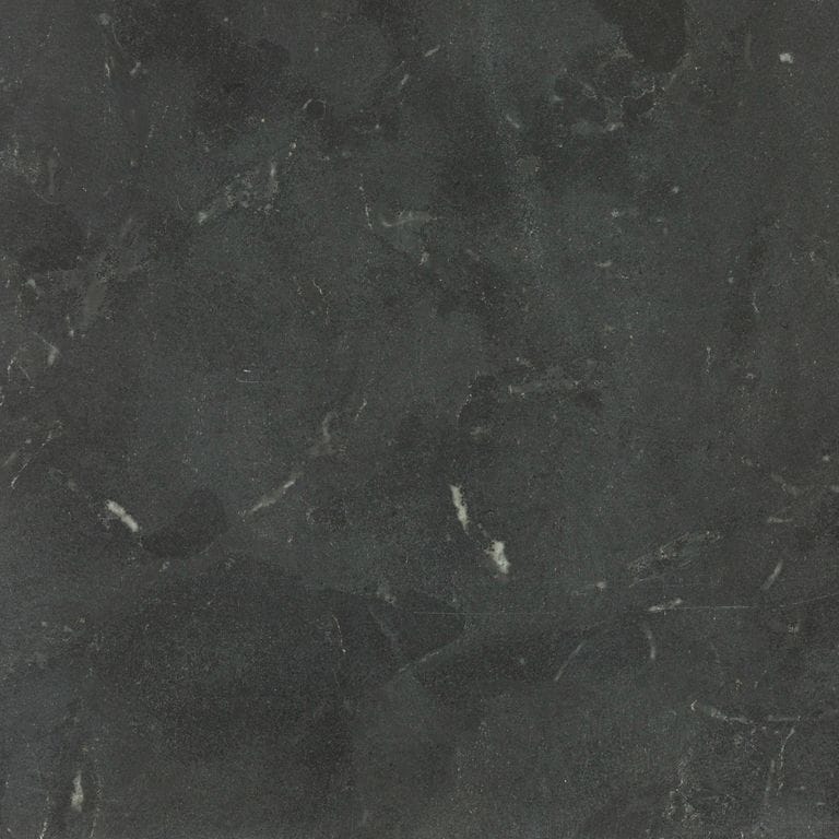 Color/Finish variation image for Limestone - Highland. The surface finish shown is honed. Dominant colors shown are black and gray; with a green secondary. Exhibits "movement" and the color mix creates a cool feeling. Swirled, blotched and cloudy color patterns.