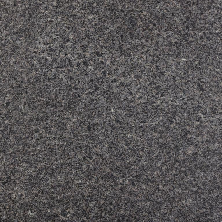 Color/Finish variation image for Granite - Charcoal Black. The surface finish shown is antiqued. The dominant color shown is gray. The color mix creates a cool feeling. Coarse speckled color pattern.