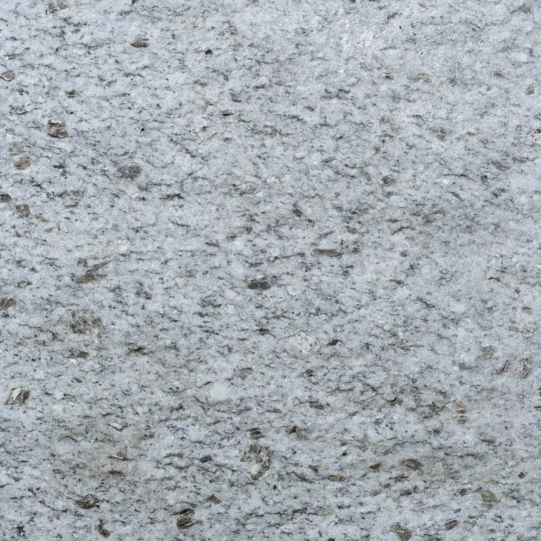 Color/Finish variation image for Granite - Chelmsford Gray. The surface finish shown is split-face. Dominant colors shown are gray and white. The color mix creates a cool feeling. Speckled color pattern.