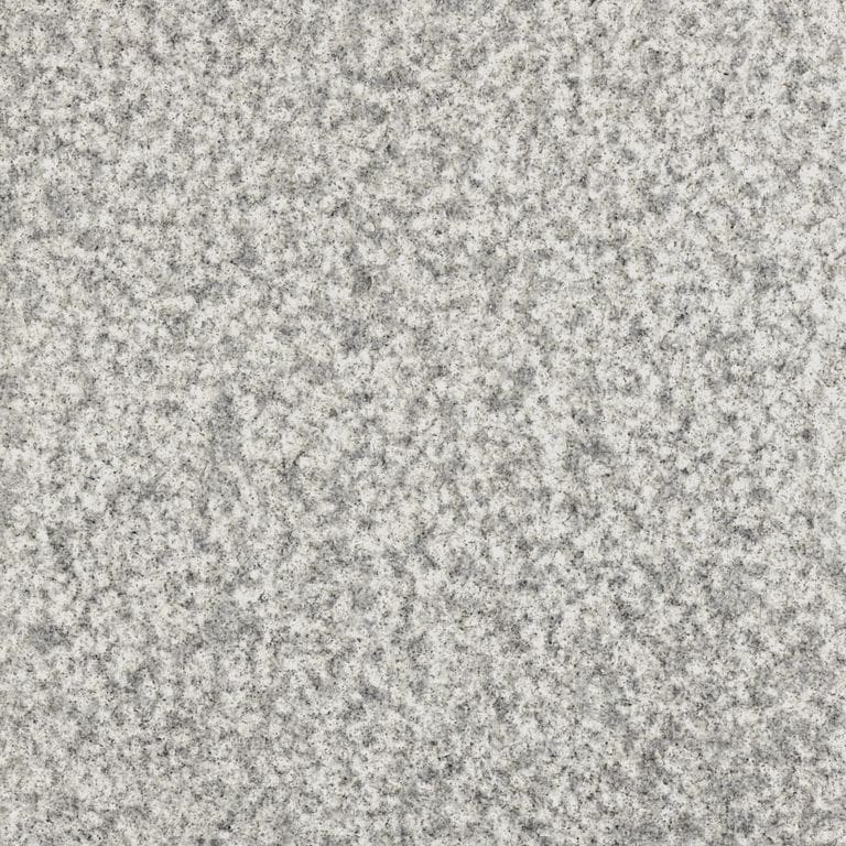 Color/Finish variation image for Chester Gray Granite. The surface finish shown is bush hammered. Dominant colors shown are gray and white; with beige and cream secondaries. The color mix creates a cool feeling. Coarse speckled color pattern.