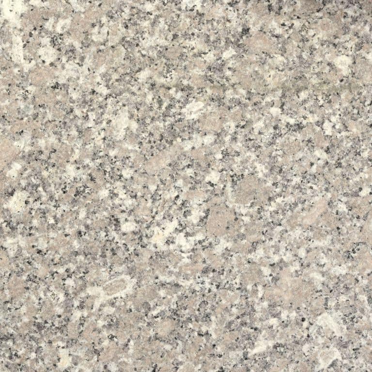 Feature image for Cormier Granite. The dominant color shown is beige; with gray, pink, white, tan and cream secondaries. The color mix creates a warm feeling. Speckled, coarse speckled and blotched color patterns.