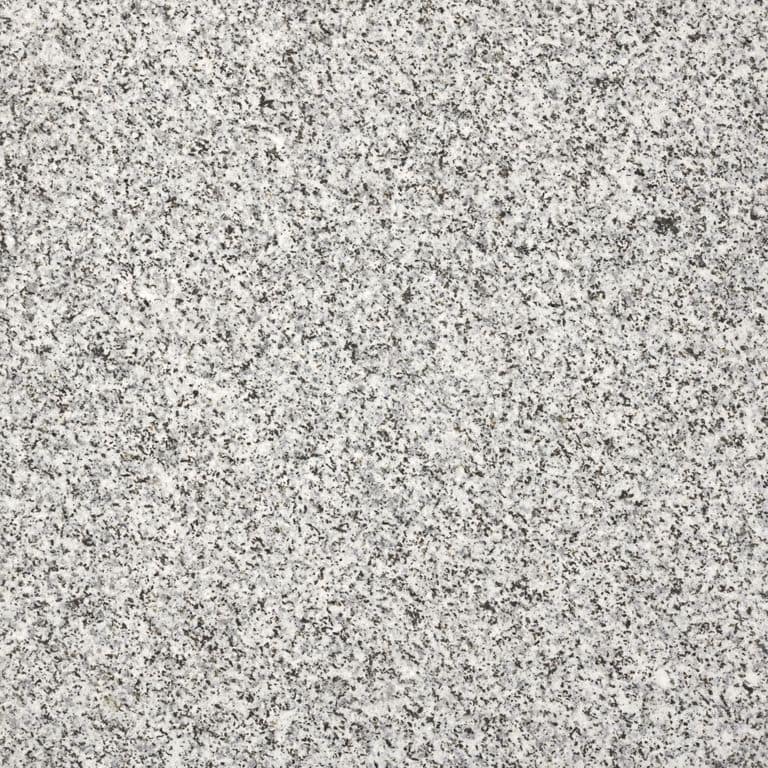 Swatch image for Granite - Dodlin Hill. The surface finish shown is flamed. The dominant color shown is gray; with beige and cream secondaries. The color mix creates a cool feeling. Fine speckled color pattern. Contains some mica and mineral inclusions.