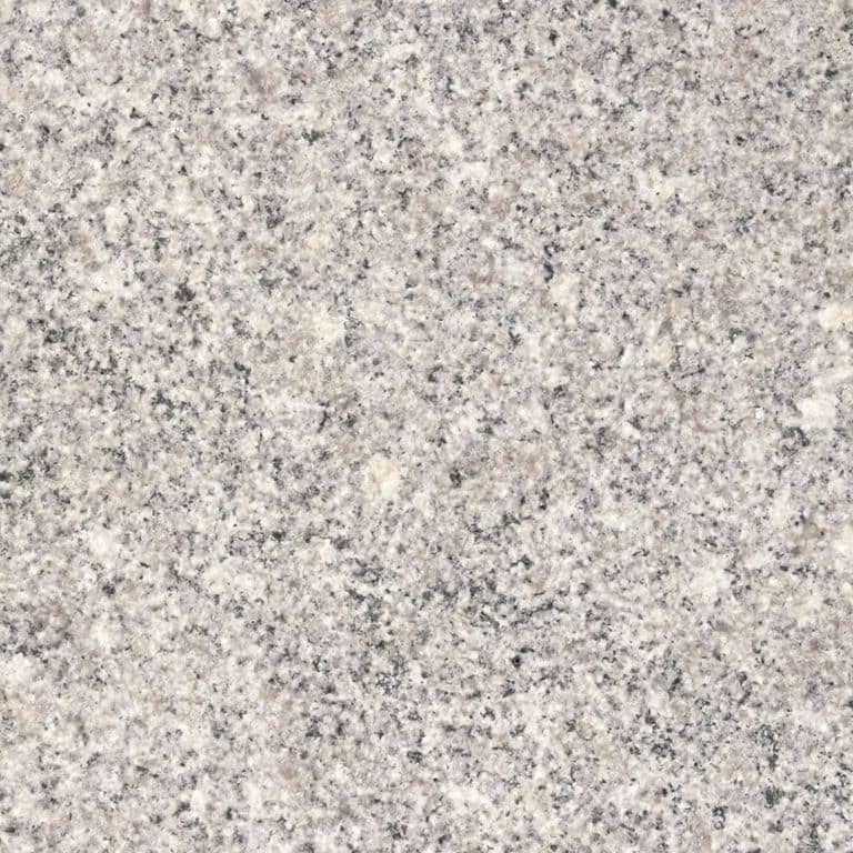 Color/Finish variation image for Englishman's Bay Granite. The surface finish shown is sand blasted. Dominant colors shown are beige, gray and pink. The color mix creates a warm feeling. Speckled and coarse speckled color patterns.