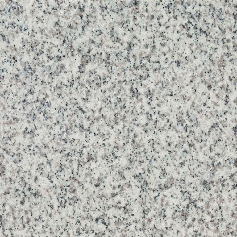 Feature image for Sesame Granite. Dominant colors shown are gray and white; with beige and cream secondaries. The color mix creates a cool feeling. Speckled and coarse speckled color patterns. Contains some mica.