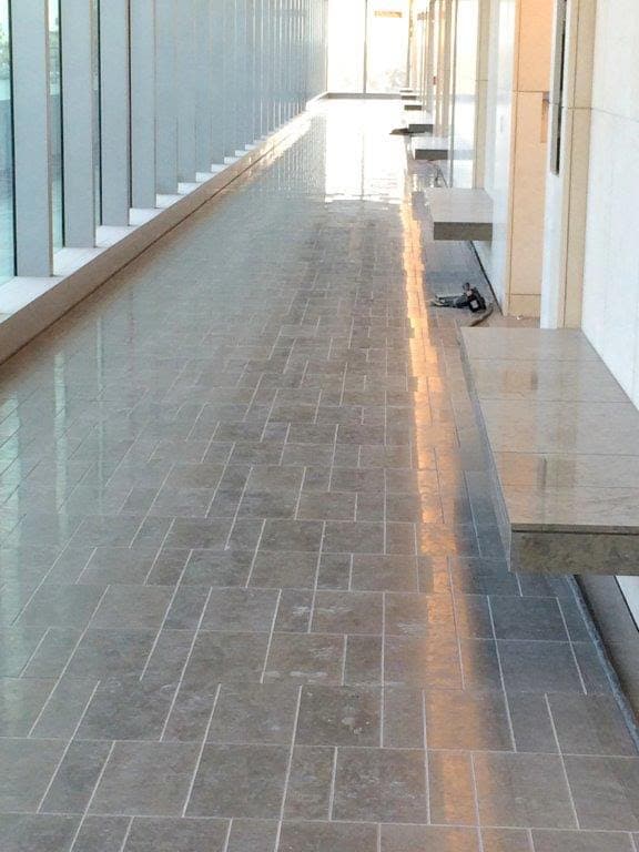 Application image for Limestone - Portuguese Dawn Haze. The image shows this material being used in an interior floor application.