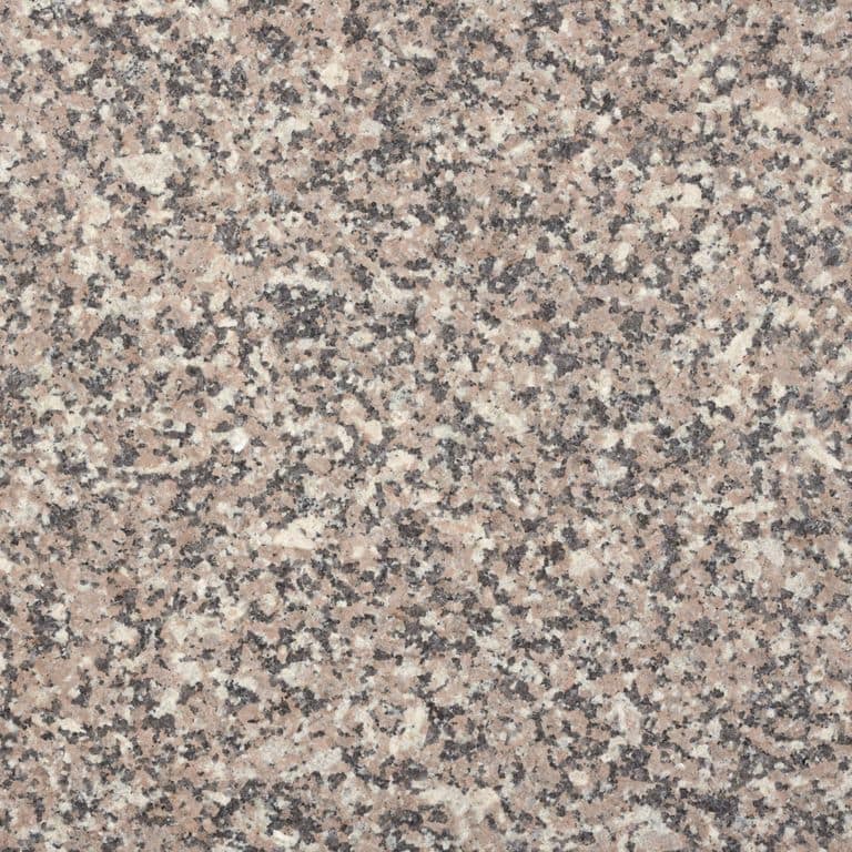 Feature image for Jonesboro Red Granite. Dominant colors shown are gray, pink and tan; with beige, brown, orange/rust, purple, white and cream secondaries. The color mix creates a warm feeling. Coarse speckled color pattern. Contains some mica.